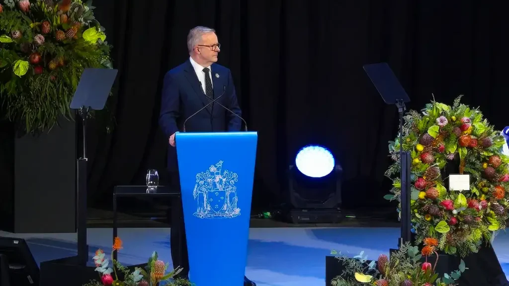 Anthony Albanese delivering a tribute at Neale Daniher’s state funeral at the MCG.